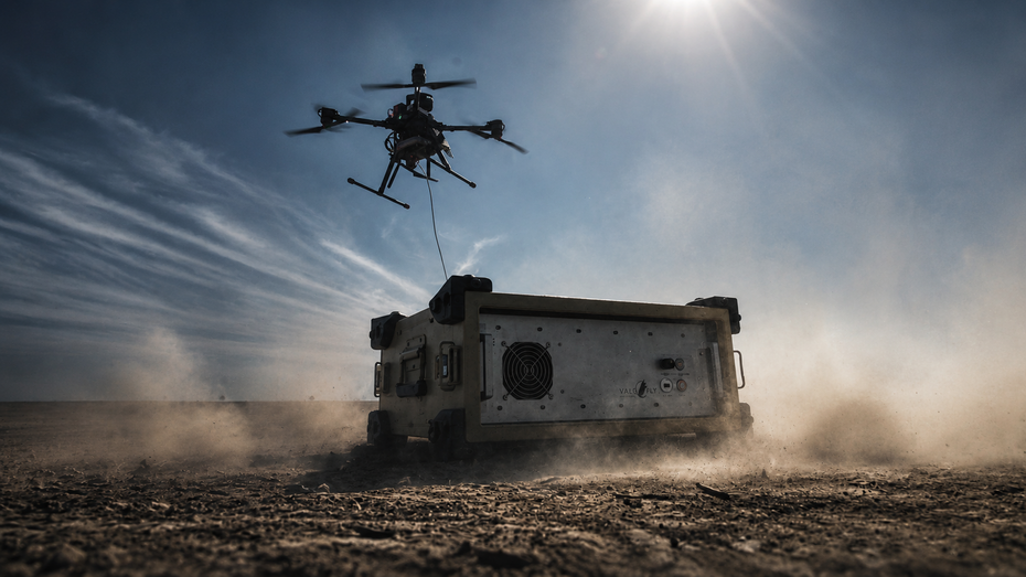 Tethered UAV in dusty field operation with cable-based ground unit