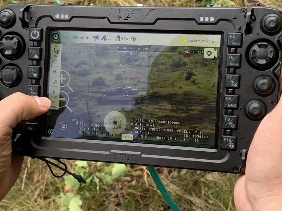 Rugged ground control station for AERIS Recon S7 displaying a live video feed and tactical operator interface during field deployment.